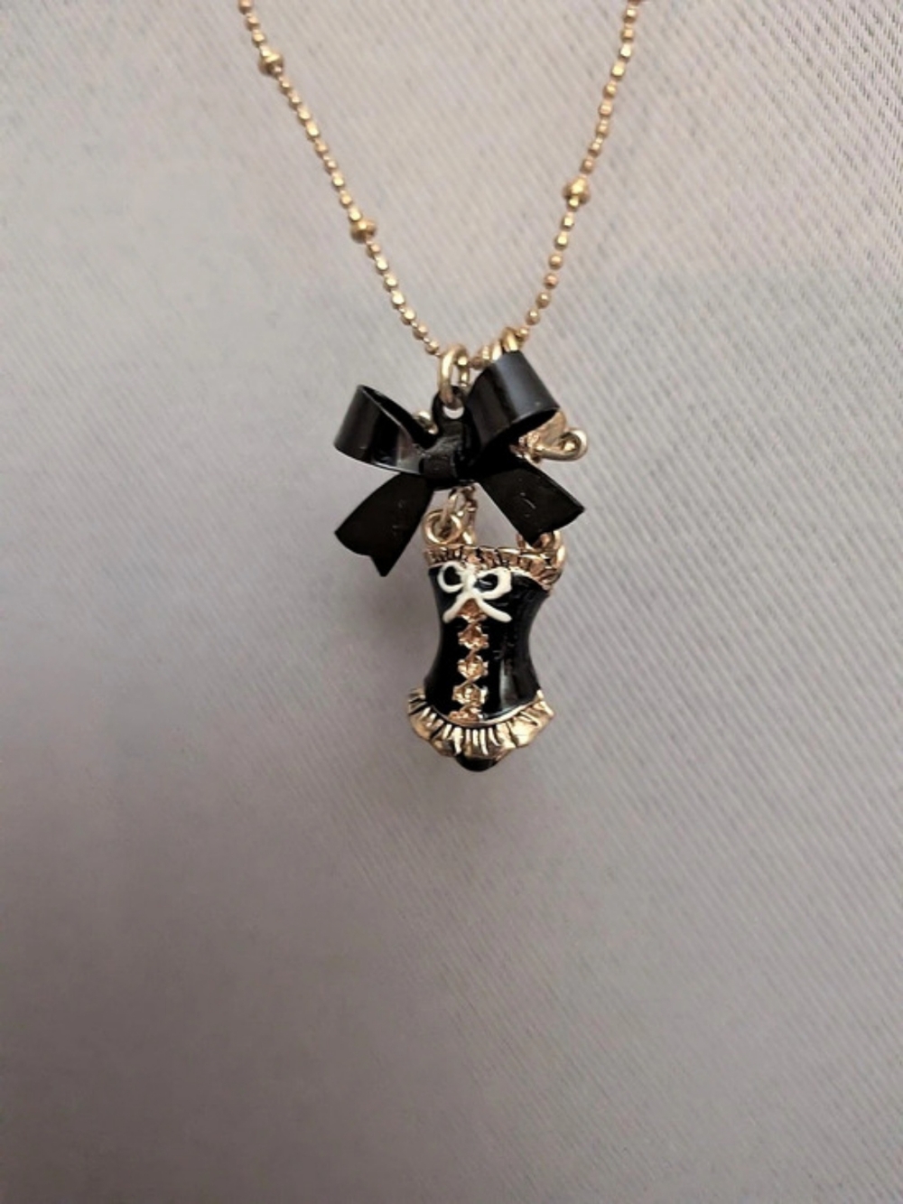 Betsey Johnson Cabaret Corset & Bow Pendant Necklace Black & Gold